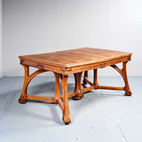 Eugène Gaillard table salle à manger noyer mouluré sculpté décor végétal vers 1900