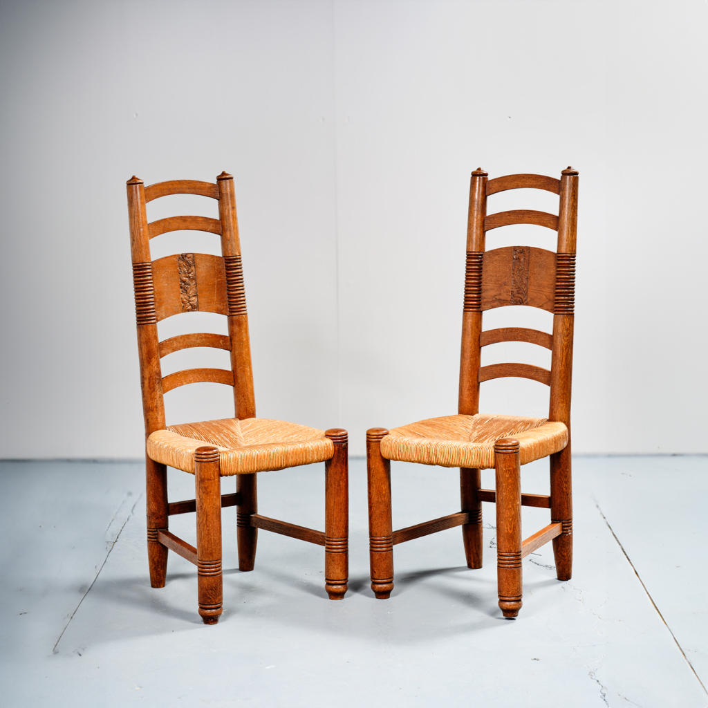 Pair of high-back chairs in carved oak, French work, 1940s-1960s