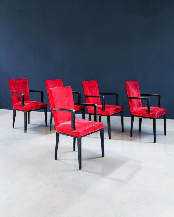 Suite de cinq fauteuils laqués noir, vers 1960
