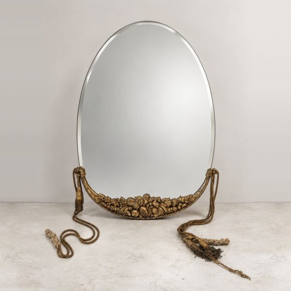 Miroir ovale en bois doré sculpté, attribué à Paul Follot (1877-1941), vers 1925